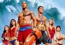 The Baywatch movie characters stand ready with ocean waves in the background, 2K Desktop Wallpaper