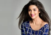A smiling Bollywood star wearing a blue dress with long flowing hair, HD Desktop Wallpaper