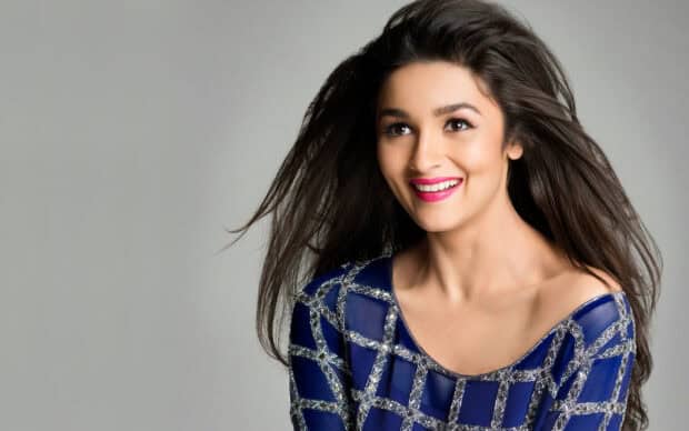 A smiling Bollywood star wearing a blue dress with long flowing hair, HD Desktop Wallpaper