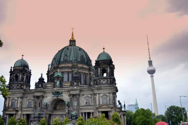 The Berlin Cathedral stands prominently with a scenic sunset sky in the background, HD Desktop Wallpaper