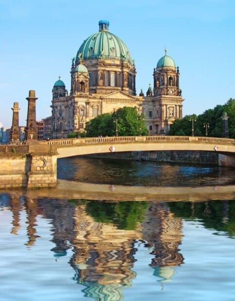 The Berlin Cathedral stands majestically with its reflection in the water on a clear day, HD Mobile Wallpaper