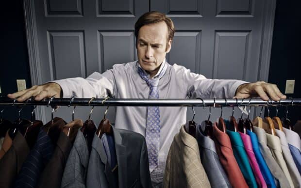 A man from Better Call Saul is choosing a suit from a clothing rack, 2K Desktop Wallpaper