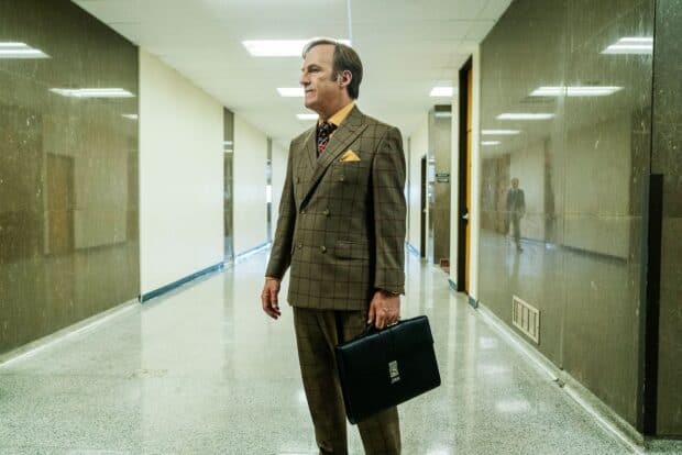 A man in a plaid suit holding a briefcase in a hallway from Better Call Saul, HD Desktop Wallpaper