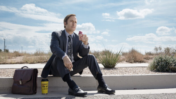 A man in a suit eating an ice cream cone in a desert setting representing Better Call Saul wallpapers, 4K Desktop Wallpaper