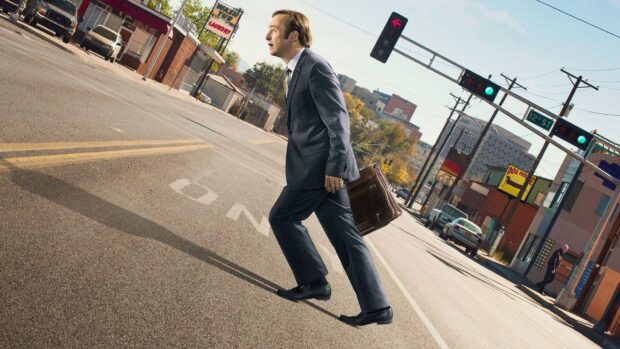 A man in a suit holding a briefcase walks across a city street in Better Call Saul, HD Desktop Wallpaper