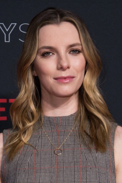 Betty Gilpin wallpapers show her wearing a checked dress and gold necklace, 2K Desktop Wallpaper