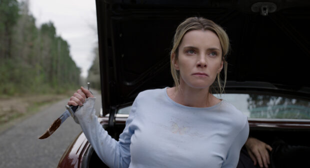 Betty Gilpin holds a knife with a determined look near a car trunk, 4K Desktop Wallpaper