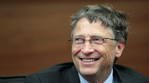 Bill Gates is smiling warmly in this close up portrait with a brown background, HD Desktop Wallpaper