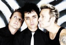 Billie Joe Armstrong and two band members pose together in front of a black and white background, HD Desktop Wallpaper