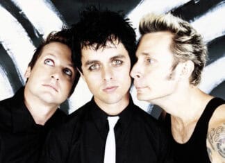 Billie Joe Armstrong and two band members pose together in front of a black and white background, HD Desktop Wallpaper