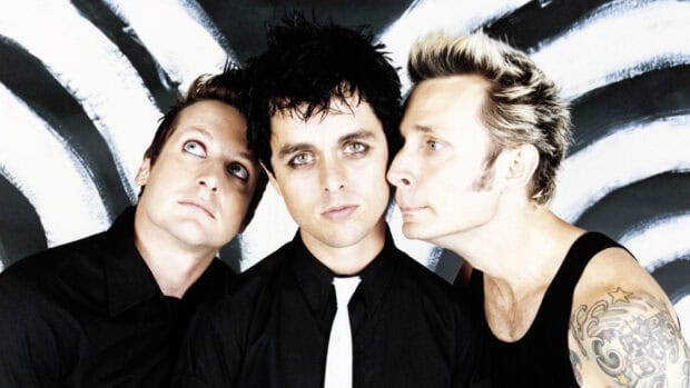 Billie Joe Armstrong and two band members pose together in front of a black and white background, HD Desktop Wallpaper