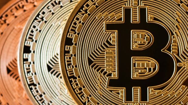 A close up view of Bitcoin digital coins showing detailed design and text, HD Desktop Wallpaper