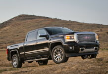 Black GMC Sierra truck with off road tires on dry field, HD Desktop Wallpaper