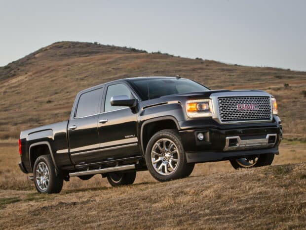 Black GMC Sierra truck with off road tires on dry field, HD Desktop Wallpaper