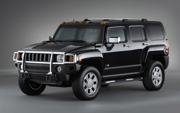 A black Hummer H3 SUV is shown in a studio with a gray backdrop, HD Desktop Wallpaper