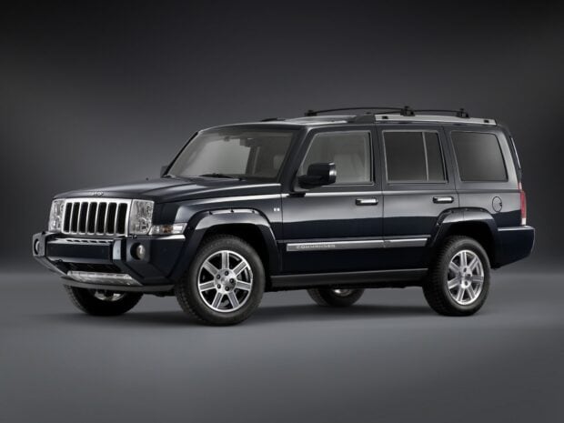A black Jeep Commander is shown in a studio with five doors and alloy wheels, HD Desktop Wallpaper