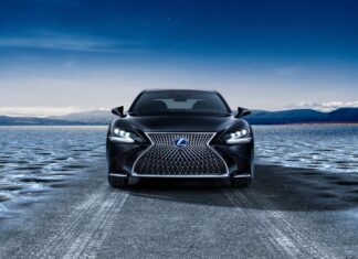 A black Lexus LC is parked on an icy road with mountains in the background under a clear sky, 4K Desktop Wallpaper