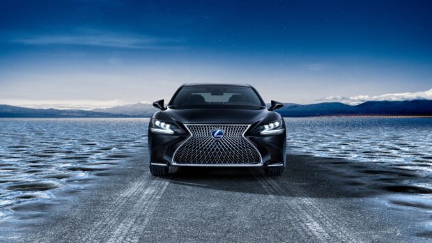 A black Lexus LC is parked on an icy road with mountains in the background under a clear sky, 4K Desktop Wallpaper