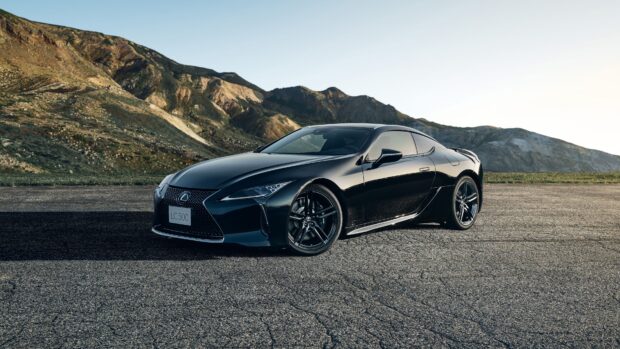 The Lexus LC sports car is parked on an asphalt road with mountains in the background, 4K Desktop Wallpaper