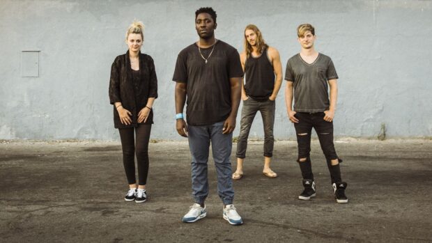The Bloc Party band poses together outdoors in casual clothes, HD Desktop Wallpaper