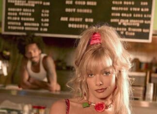 A blonde woman with a red top and necklace stands confidently in a diner scene from My Name Is Earl tv series, HD Mobile Wallpaper