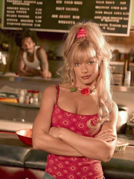 A blonde woman with a red top and necklace stands confidently in a diner scene from My Name Is Earl tv series, HD Mobile Wallpaper