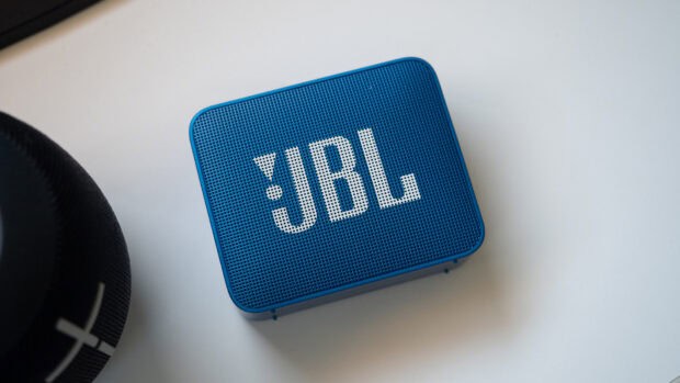 A close up of a blue JBL speaker with the logo clearly visible on the front grill, HD Desktop Wallpaper