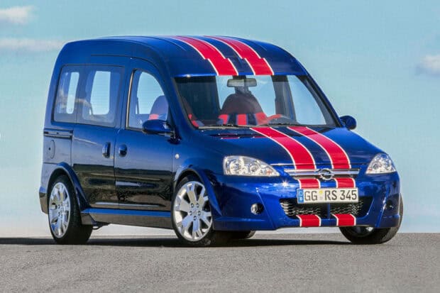 Blue Opel Combo with red racing stripes parked on asphalt under clear sky, 2K Desktop Wallpaper