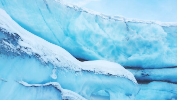 Close up of blue glacier formations with snow and ice in a cold environment, 4K Desktop Wallpaper