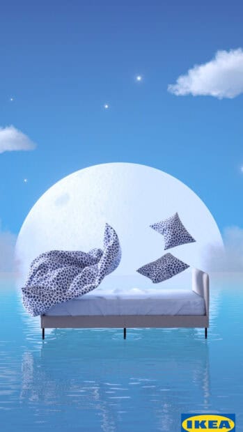 A blue patterned bed set floats over water under a large moon in Ikea wallpapers, HD Mobile Wallpaper