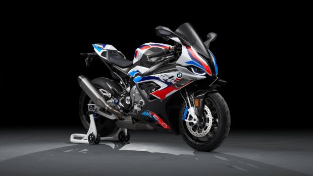 A sporty Bmw M 1000 Rr motorcycle with red blue and white details on display, 4K Desktop Wallpaper