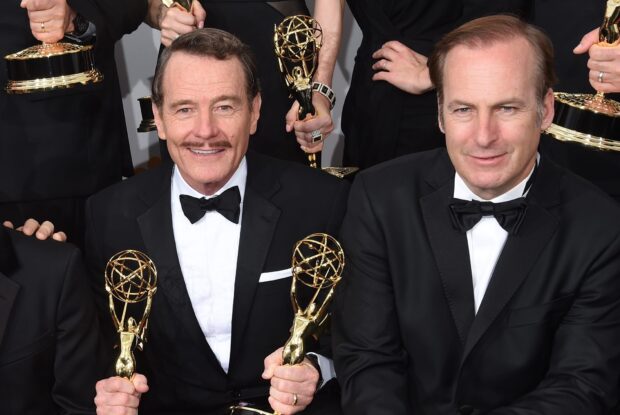 Bob Odenkirk is smiling while holding Emmy awards at an event, HD Desktop Wallpaper