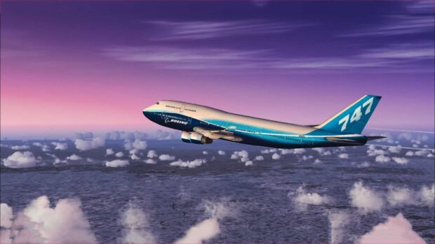 A Boeing 747 soars above scattered clouds during a colorful sunset sky, HD Desktop Wallpaper