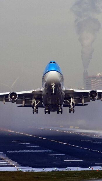 A Boeing 747 is captured flying low above the runway during takeoff, HD Mobile Wallpaper