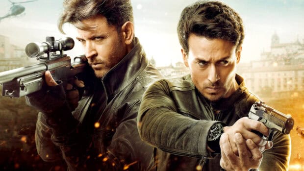 Two Bollywood actors hold guns in an intense action pose, HD Desktop Wallpaper