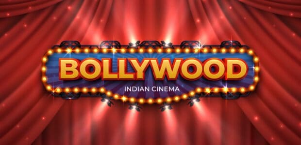 The Bollywood Wallpapers sign is displayed with glowing lights on a red curtain background, HD Desktop Wallpaper