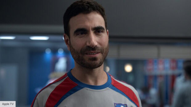 Brett Goldstein is smiling warmly in a sports setting, HD Desktop Wallpaper