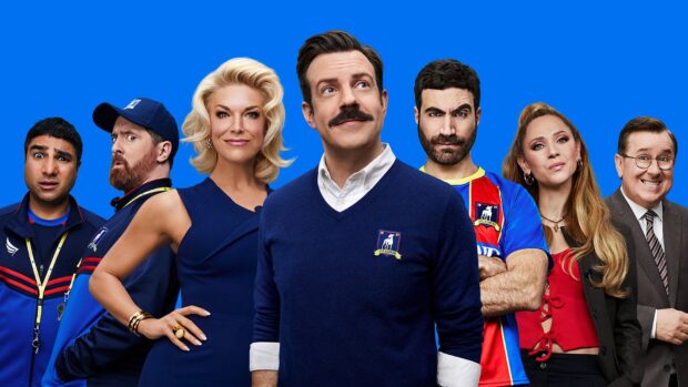Brett Goldstein stands with other Ted Lasso cast members in a group photo, HD Desktop Wallpaper