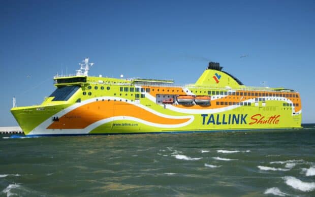 A colorful ferry sails smoothly on the ocean under a clear sky with seagulls flying nearby, HD Desktop Wallpaper