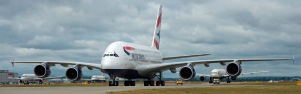 A British Airways aircraft is taxiing on the airport runway under cloudy skies, 4K Desktop Wallpaper