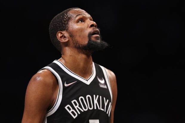 A Brooklyn Nets player looks upwards showing determination, 2K Desktop Wallpaper