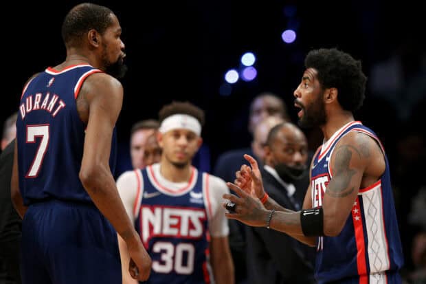 Two Brooklyn Nets players are engaged in discussion during the game, 2K Desktop Wallpaper