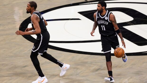 Two Brooklyn Nets players compete during a basketball game on the court, 2K Desktop Wallpaper