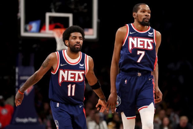 Two Brooklyn Nets players are focused during a basketball game, 2K Desktop Wallpaper