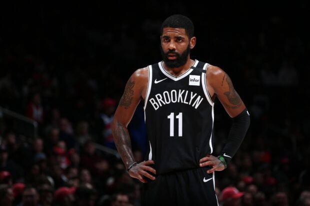 A Brooklyn Nets player is deeply focused during the basketball game on the court, 2K Desktop Wallpaper