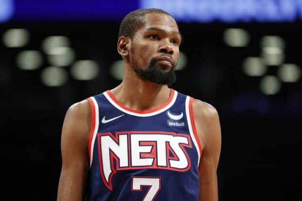 A Brooklyn Nets player is seen focused during a game in his team jersey, HD Desktop Wallpaper