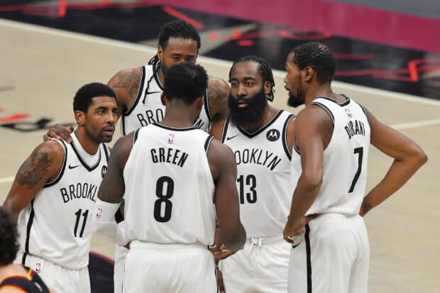 The Brooklyn Nets players are having a team huddle during a game, 2K Desktop Wallpaper