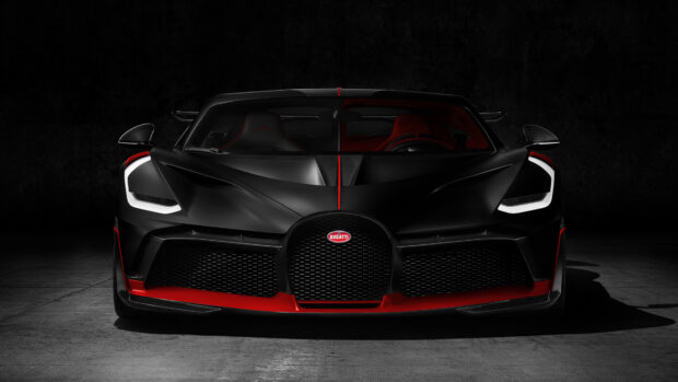 A Bugatti Divo is shown from the front with distinct red and black details in a dark setting, 4K Desktop Wallpaper