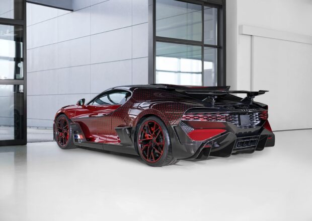 A red and black Bugatti Divo sports car parked indoors, HD Desktop Wallpaper