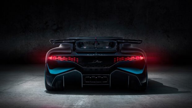 The Bugatti Divo displays its sleek rear design with illuminated taillights, 4K Desktop Wallpaper